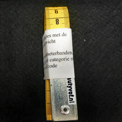 Sewing tape weight for measuring lengths